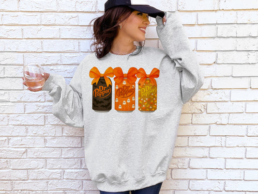 "THREE CANS WITH BOWS"